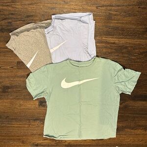 Nike T-Shirt Trio in Mint, Light Blue, and Heather Gray